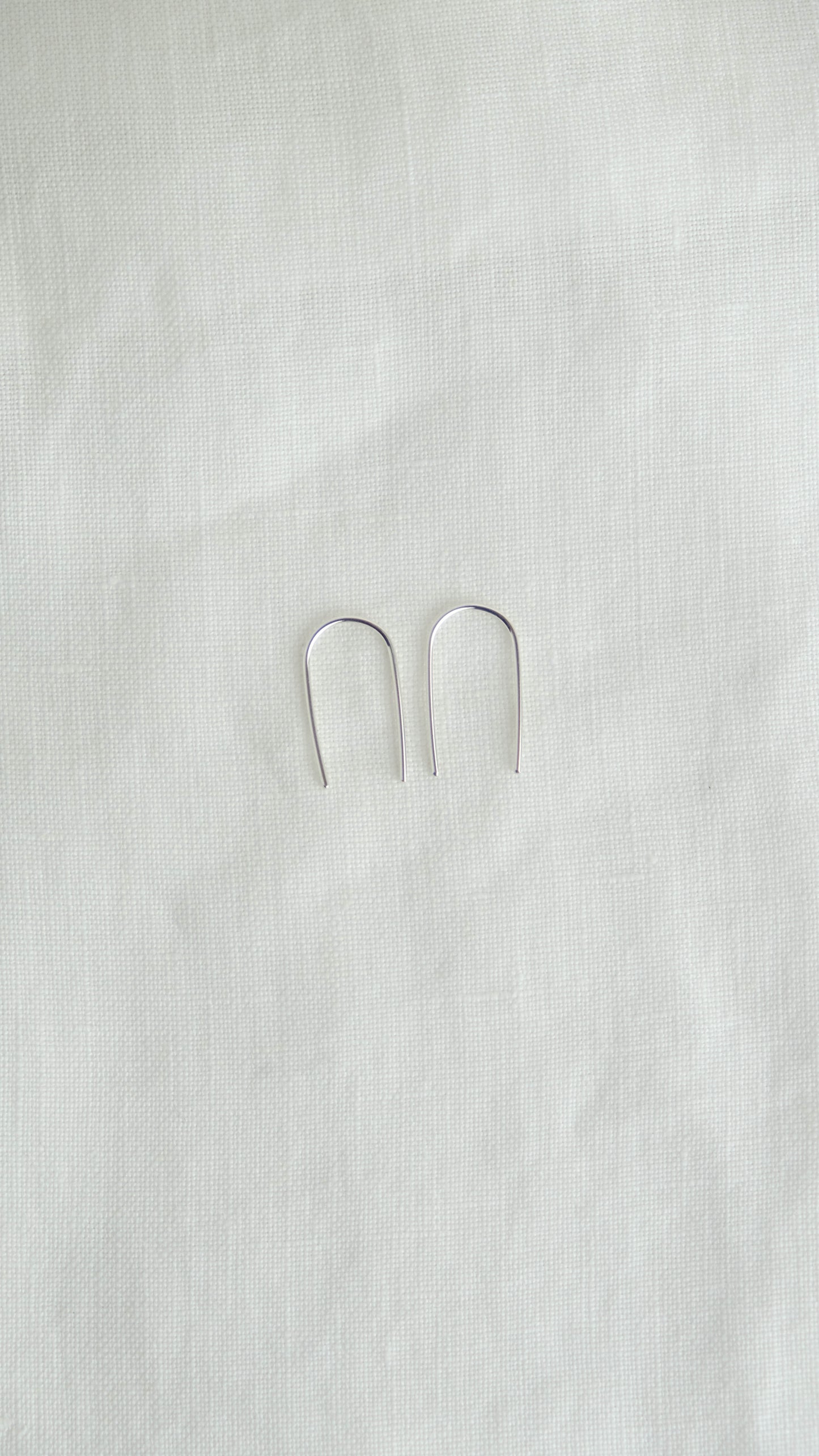 silver arc earrings