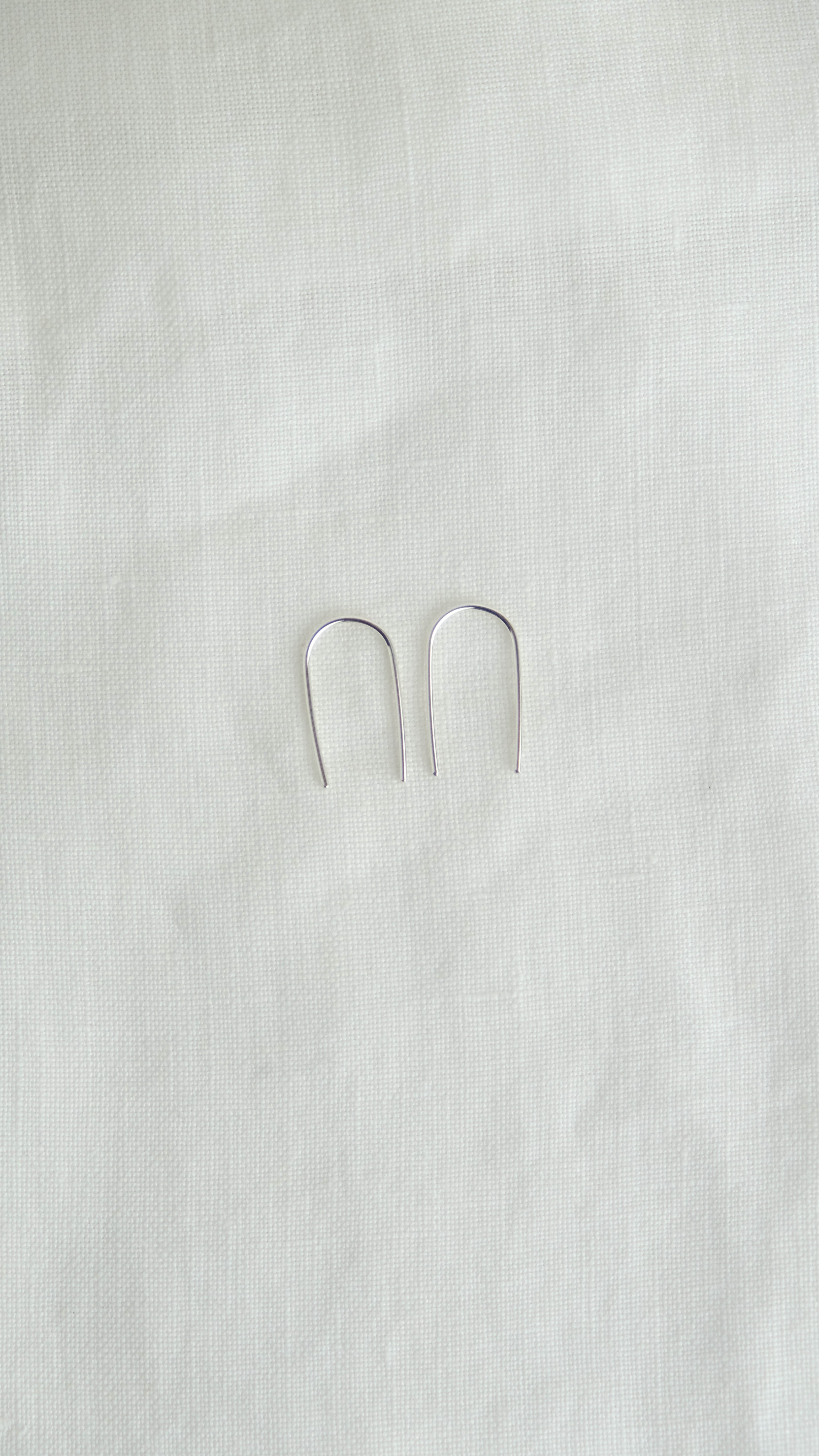 silver arc earrings