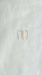 gold arc earrings