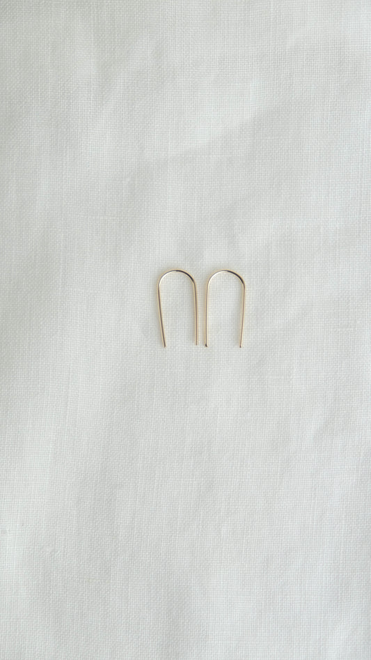 gold arc earrings