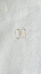 gold geometric arc earrings