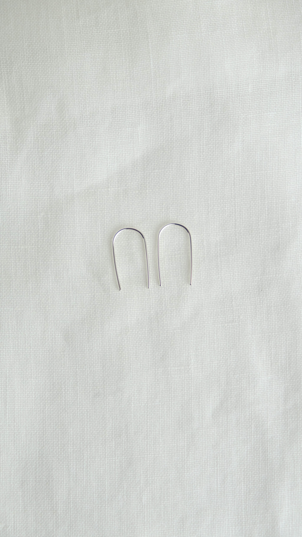 silver arc earrings