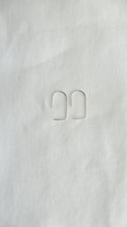 silver geometric arc earrings